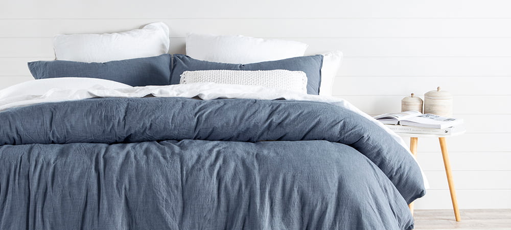 Bed with navy sheets